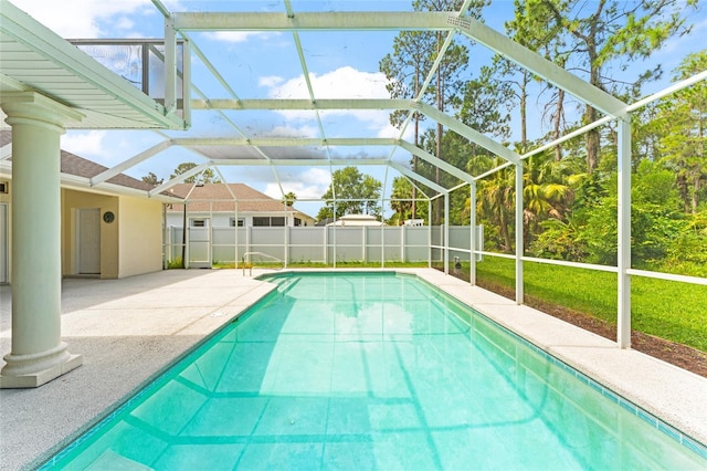 68 Egret Trl, Palm Coast, FL 32164 - view of swimming pool featuring a patio and a lanai