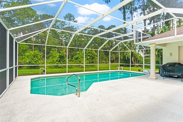 68 Egret Trl, Palm Coast, FL 32164 - outdoor pool with a patio and glass enclosure