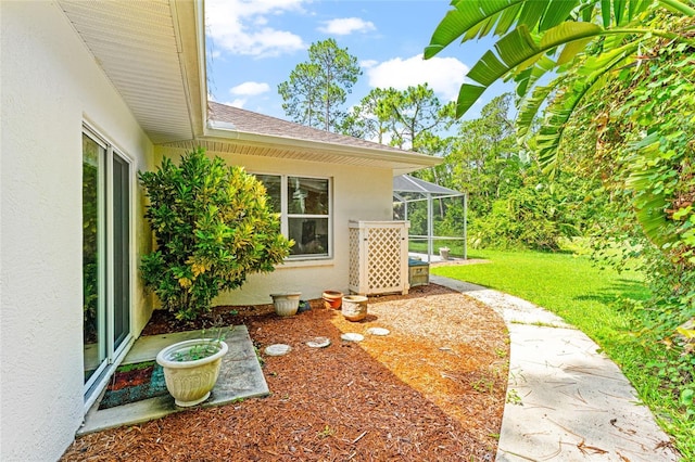 68 Egret Trl, Palm Coast, FL 32164 - view of grassy yard featuring glass enclosure