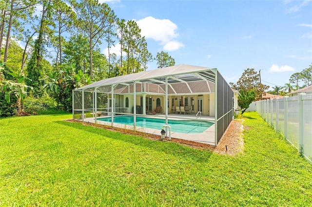 68 Egret Trl, Palm Coast, FL 32164 - view of swimming pool with a patio and glass enclosure