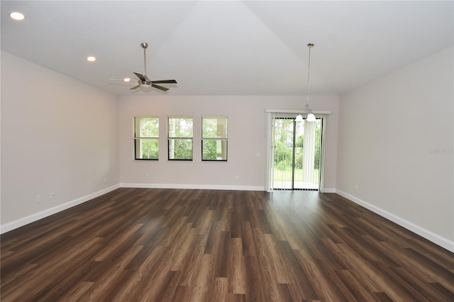 77 Green Cir, Palm Coast, FL 32164 - unfurnished room with healthy amount of natural light, a chandelier, ceiling fan, recessed lighting, and dark wood-style floors