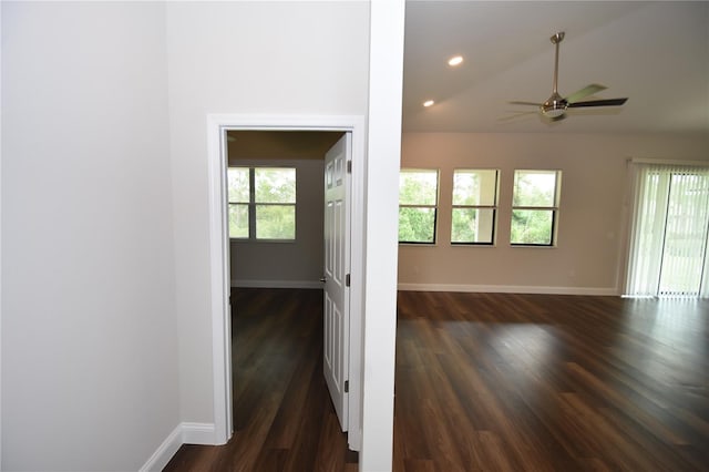 77 Green Cir, Palm Coast, FL 32164 - unfurnished room with dark wood-style flooring, a ceiling fan, lofted ceiling, and recessed lighting