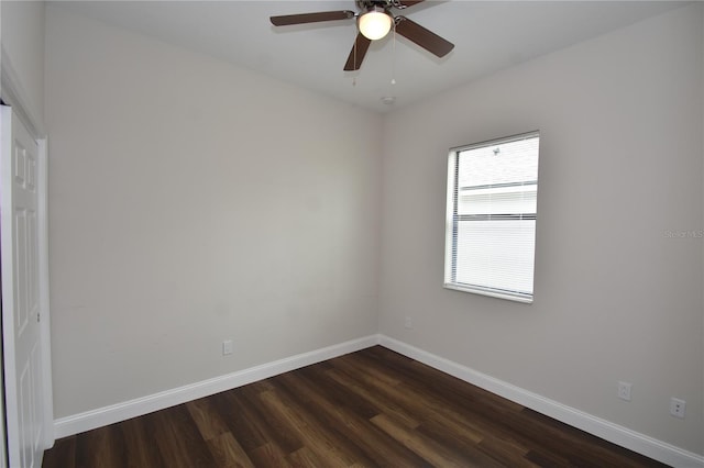 77 Green Cir, Palm Coast, FL 32164 - spare room featuring dark wood-style floors and a ceiling fan
