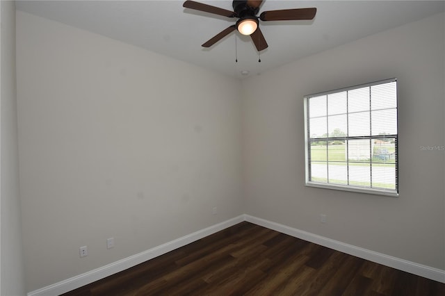 77 Green Cir, Palm Coast, FL 32164 - spare room featuring dark wood-type flooring and a ceiling fan