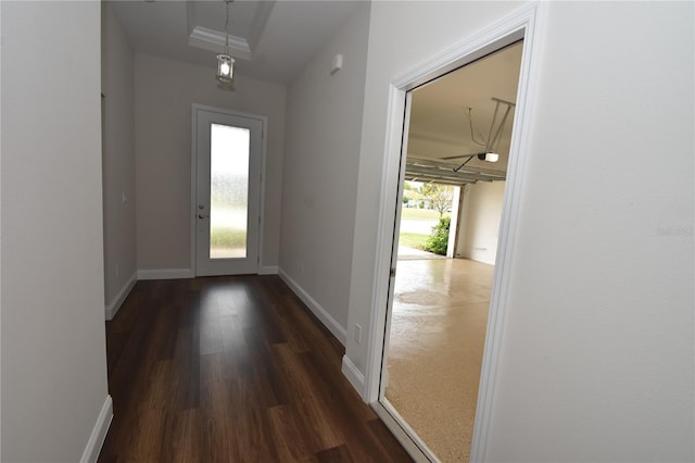 77 Green Cir, Palm Coast, FL 32164 - doorway with dark wood-style flooring and baseboards