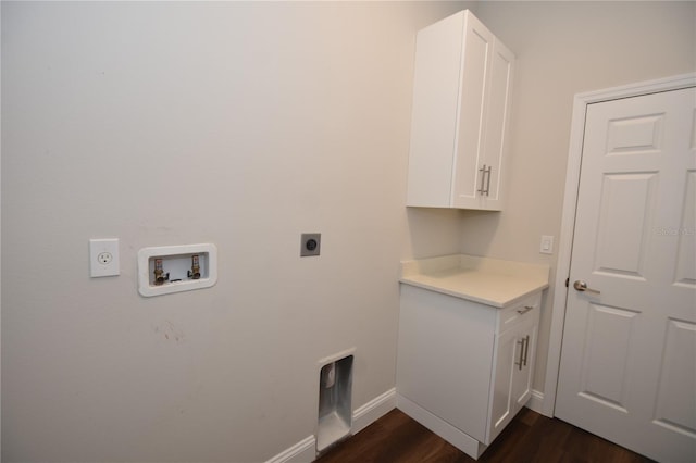 77 Green Cir, Palm Coast, FL 32164 - washroom with electric dryer hookup, hookup for a washing machine, dark wood-type flooring, and cabinet space