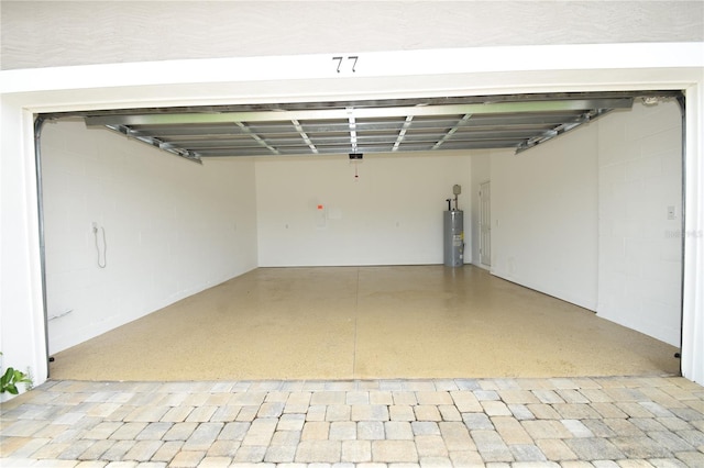 77 Green Cir, Palm Coast, FL 32164 - garage featuring water heater