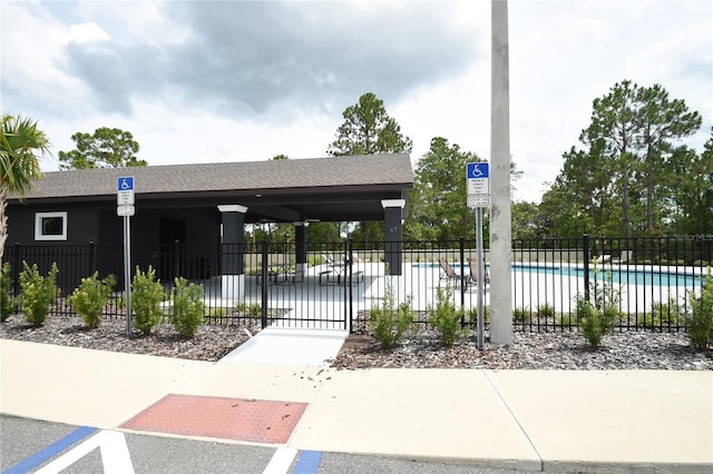 77 Green Cir, Palm Coast, FL 32164 - view of community with a pool