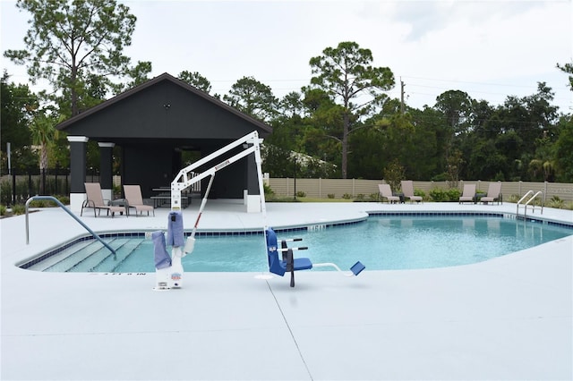 77 Green Cir, Palm Coast, FL 32164 - community pool featuring a patio area and a gazebo