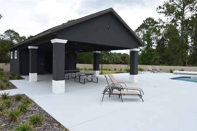 77 Green Cir, Palm Coast, FL 32164 - view of patio / terrace with a ceiling fan