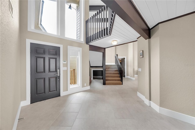 9353 Old A1A, Saint Augustine, FL 32080 - tiled entrance foyer featuring stairs and a textured wall