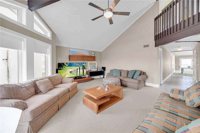 9353 Old A1A, Saint Augustine, FL 32080 - living room with high vaulted ceiling, ceiling fan, carpet floors, and beamed ceiling