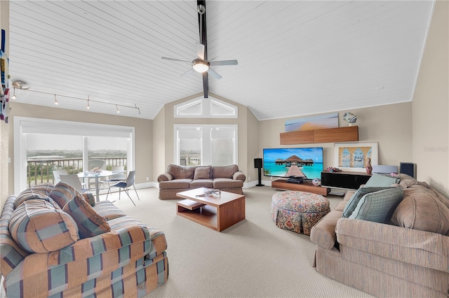 9353 Old A1A, Saint Augustine, FL 32080 - living room with vaulted ceiling, a ceiling fan, and carpet