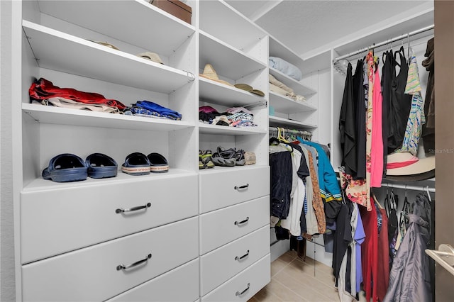 9353 Old A1A, Saint Augustine, FL 32080 - walk in closet with light tile patterned flooring