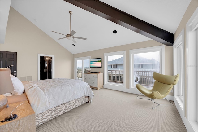 9353 Old A1A, Saint Augustine, FL 32080 - bedroom featuring light colored carpet, high vaulted ceiling, access to exterior, and ceiling fan