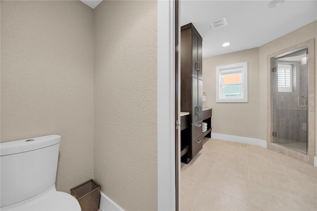9353 Old A1A, Saint Augustine, FL 32080 - bathroom with a shower stall, tile patterned flooring, vanity, and recessed lighting