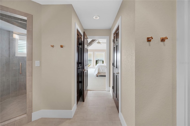 9353 Old A1A, Saint Augustine, FL 32080 - hall featuring light tile patterned floors and a textured wall