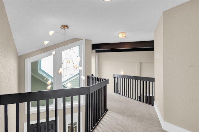 9353 Old A1A, Saint Augustine, FL 32080 - hall featuring a textured wall, carpet flooring, and lofted ceiling
