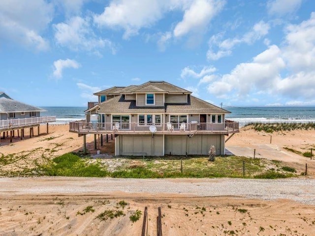 9353 Old A1A, Saint Augustine, FL 32080 - back of property with a deck with water view and a beach view