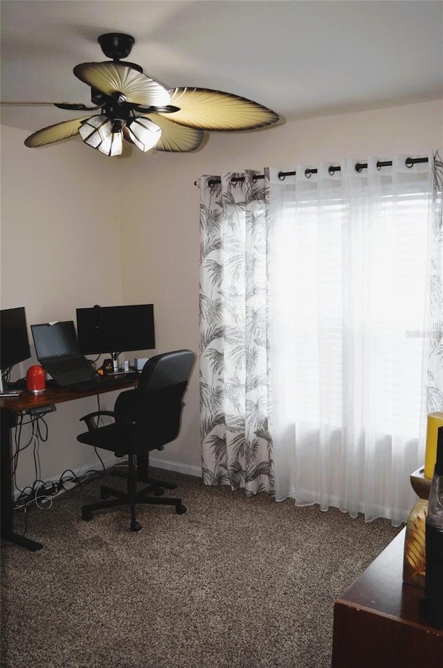 35 Putter Dr, Palm Coast, FL 32164 - home office with carpet floors and a ceiling fan
