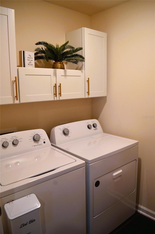 35 Putter Dr, Palm Coast, FL 32164 - washroom with cabinet space and washing machine and dryer