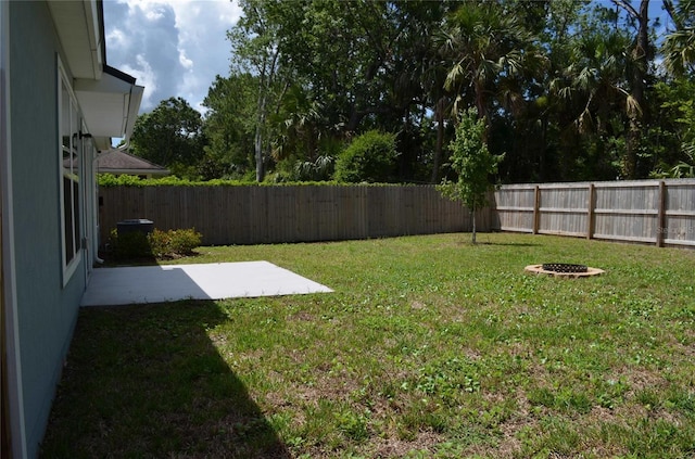 35 Putter Dr, Palm Coast, FL 32164 - fenced backyard featuring a patio