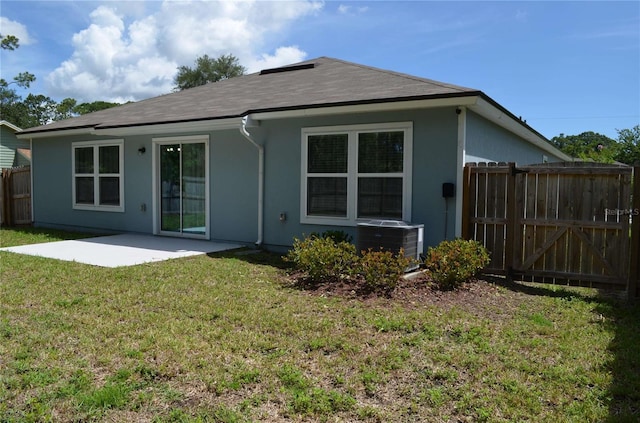 35 Putter Dr, Palm Coast, FL 32164 - rear view of property featuring a patio area and stucco siding