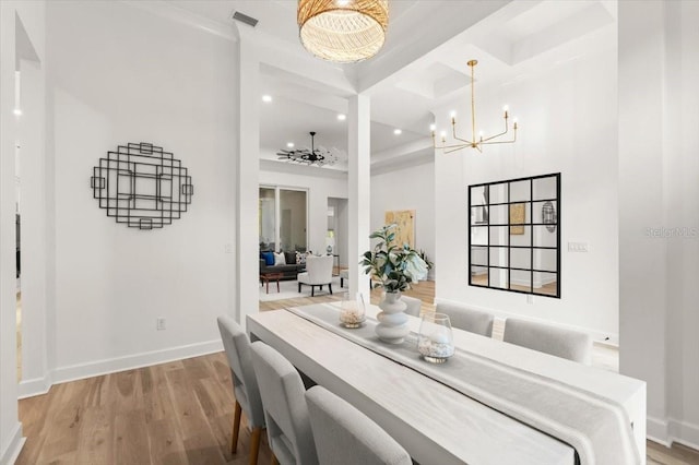 476 Stirling Bridge Dr, Ormond Beach, FL 32174 - dining room featuring a chandelier, wood finished floors, and recessed lighting