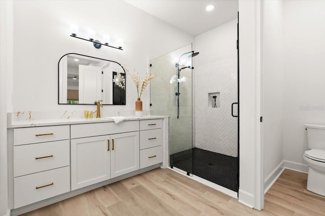 476 Stirling Bridge Dr, Ormond Beach, FL 32174 - full bath featuring a stall shower, vanity, and wood finished floors