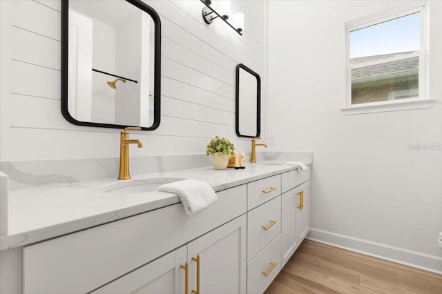 476 Stirling Bridge Dr, Ormond Beach, FL 32174 - full bathroom with double vanity and wood finished floors