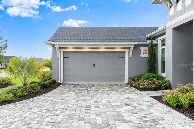 476 Stirling Bridge Dr, Ormond Beach, FL 32174 - garage with decorative driveway