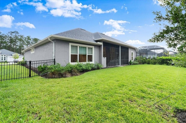 476 Stirling Bridge Dr, Ormond Beach, FL 32174 - back of property with a sunroom and stucco siding