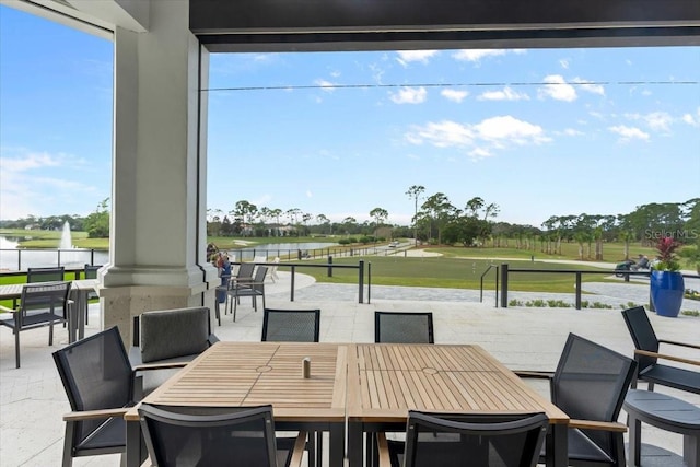 476 Stirling Bridge Dr, Ormond Beach, FL 32174 - view of patio featuring view of golf course, a water view, and outdoor dining area
