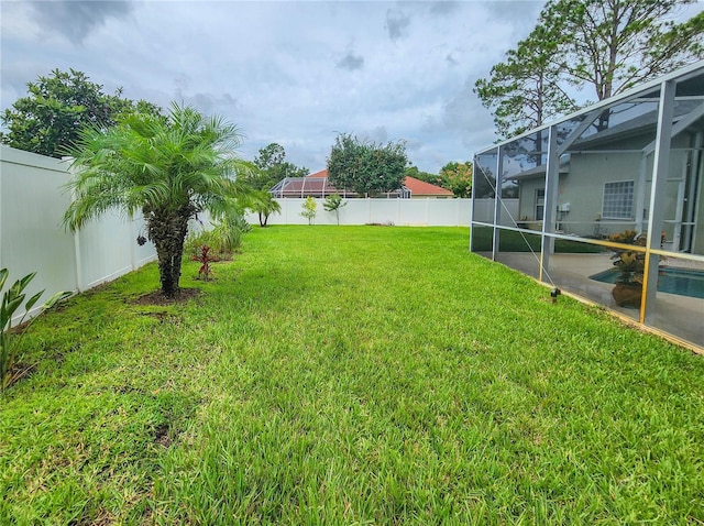 8 Wiltshire Pl, Palm Coast, FL 32164 - fenced backyard with glass enclosure