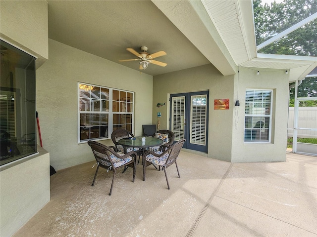 8 Wiltshire Pl, Palm Coast, FL 32164 - view of patio / terrace with a ceiling fan, a lanai, and outdoor dining space