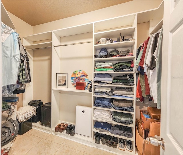 8 Wiltshire Pl, Palm Coast, FL 32164 - walk in closet with tile patterned floors