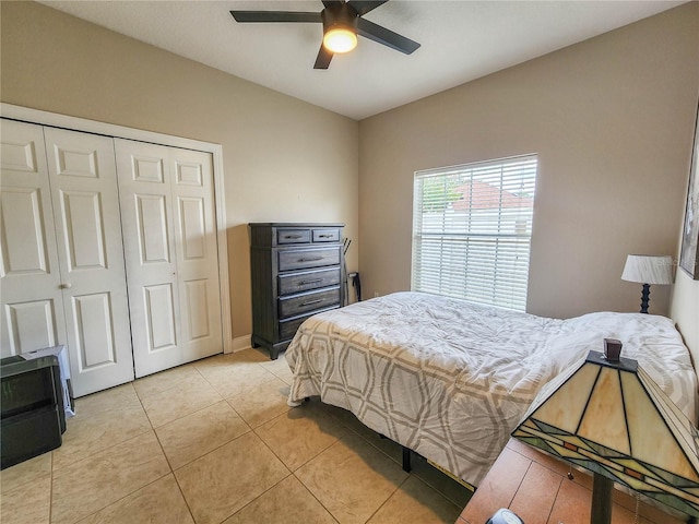 8 Wiltshire Pl, Palm Coast, FL 32164 - bedroom featuring a closet, light tile patterned floors, and ceiling fan