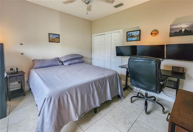 8 Wiltshire Pl, Palm Coast, FL 32164 - bedroom with light tile patterned floors, a closet, a desk, and a ceiling fan