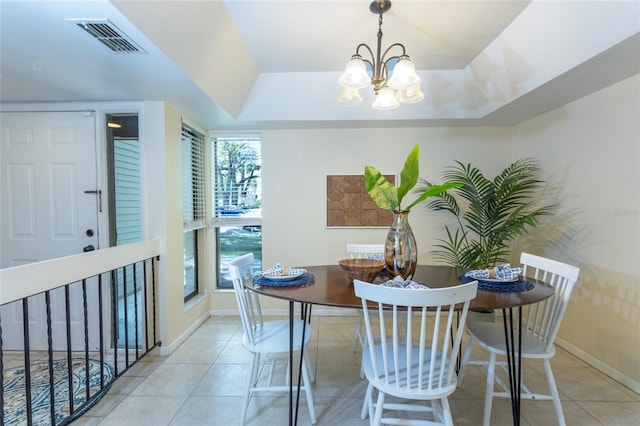 11 Surrey Ct Unit 11, Palm Coast, FL 32137 - dining area featuring a chandelier and tile patterned floors