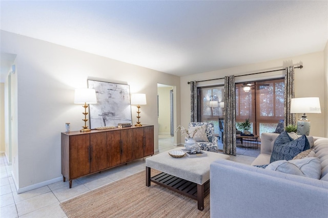 11 Surrey Ct Unit 11, Palm Coast, FL 32137 - living room featuring light tile patterned flooring and baseboards
