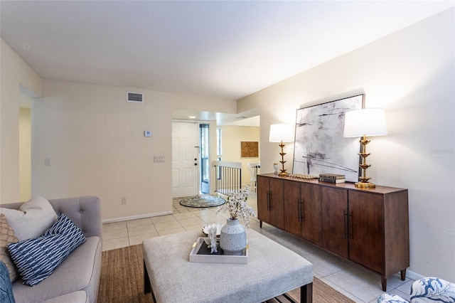 11 Surrey Ct Unit 11, Palm Coast, FL 32137 - living room featuring light tile patterned floors and baseboards