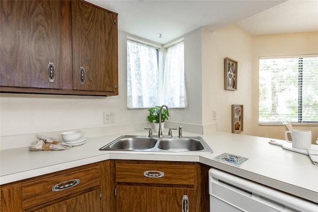 11 Surrey Ct Unit 11, Palm Coast, FL 32137 - kitchen with dishwasher and light countertops