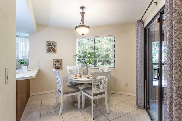 11 Surrey Ct Unit 11, Palm Coast, FL 32137 - dining area featuring light tile patterned floors