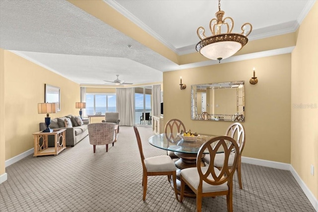 200 Ocean Crest Dr Unit 813, Palm Coast, FL 32137 - carpeted dining room with ornamental molding and ceiling fan