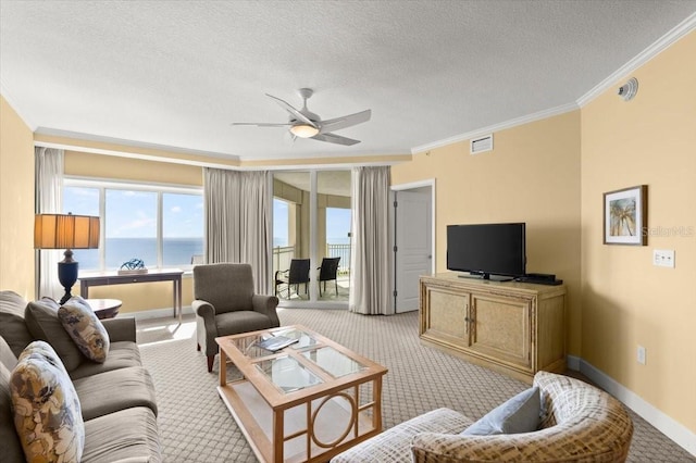 200 Ocean Crest Dr Unit 813, Palm Coast, FL 32137 - living area featuring carpet floors, a textured ceiling, a ceiling fan, and crown molding