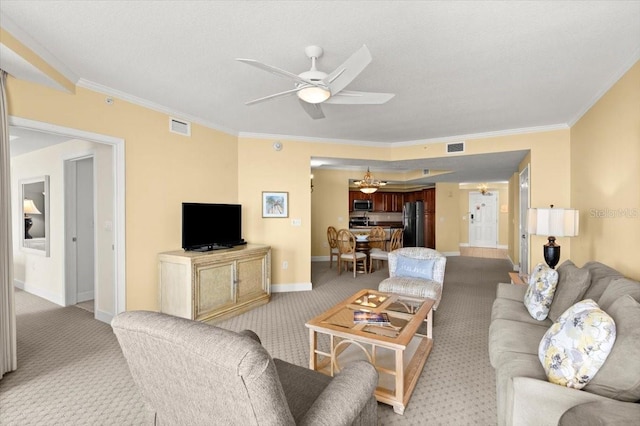 200 Ocean Crest Dr Unit 813, Palm Coast, FL 32137 - living room featuring a ceiling fan, ornamental molding, and light carpet