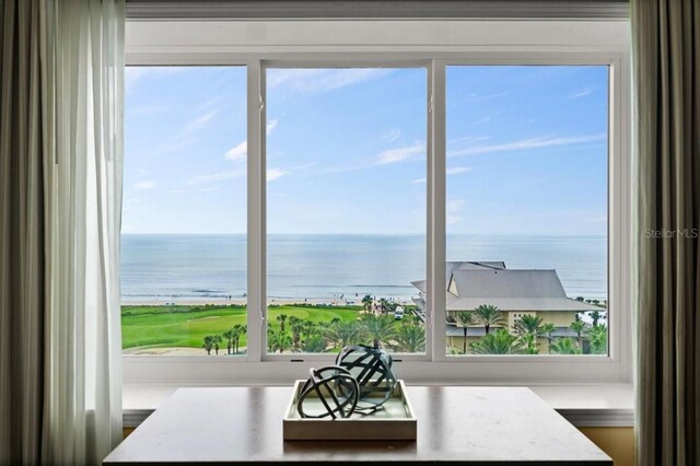 200 Ocean Crest Dr Unit 813, Palm Coast, FL 32137 - dining area with healthy amount of natural light and a water view