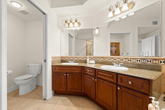 200 Ocean Crest Dr Unit 813, Palm Coast, FL 32137 - bathroom with double vanity, tile patterned floors, and a shower with shower door