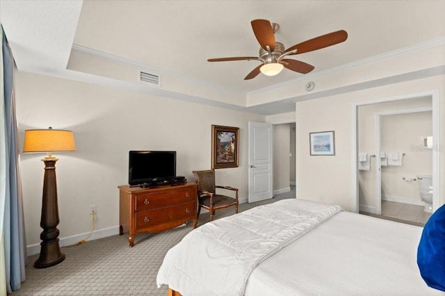 200 Ocean Crest Dr Unit 813, Palm Coast, FL 32137 - bedroom with ornamental molding, a tray ceiling, ensuite bathroom, and ceiling fan