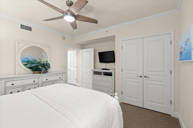200 Ocean Crest Dr Unit 813, Palm Coast, FL 32137 - carpeted bedroom with ornamental molding, a closet, and ceiling fan
